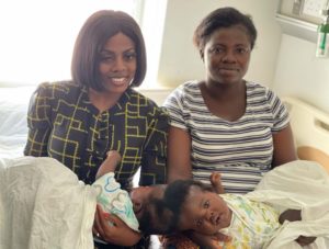 Nana Aba with the conjoined twins 