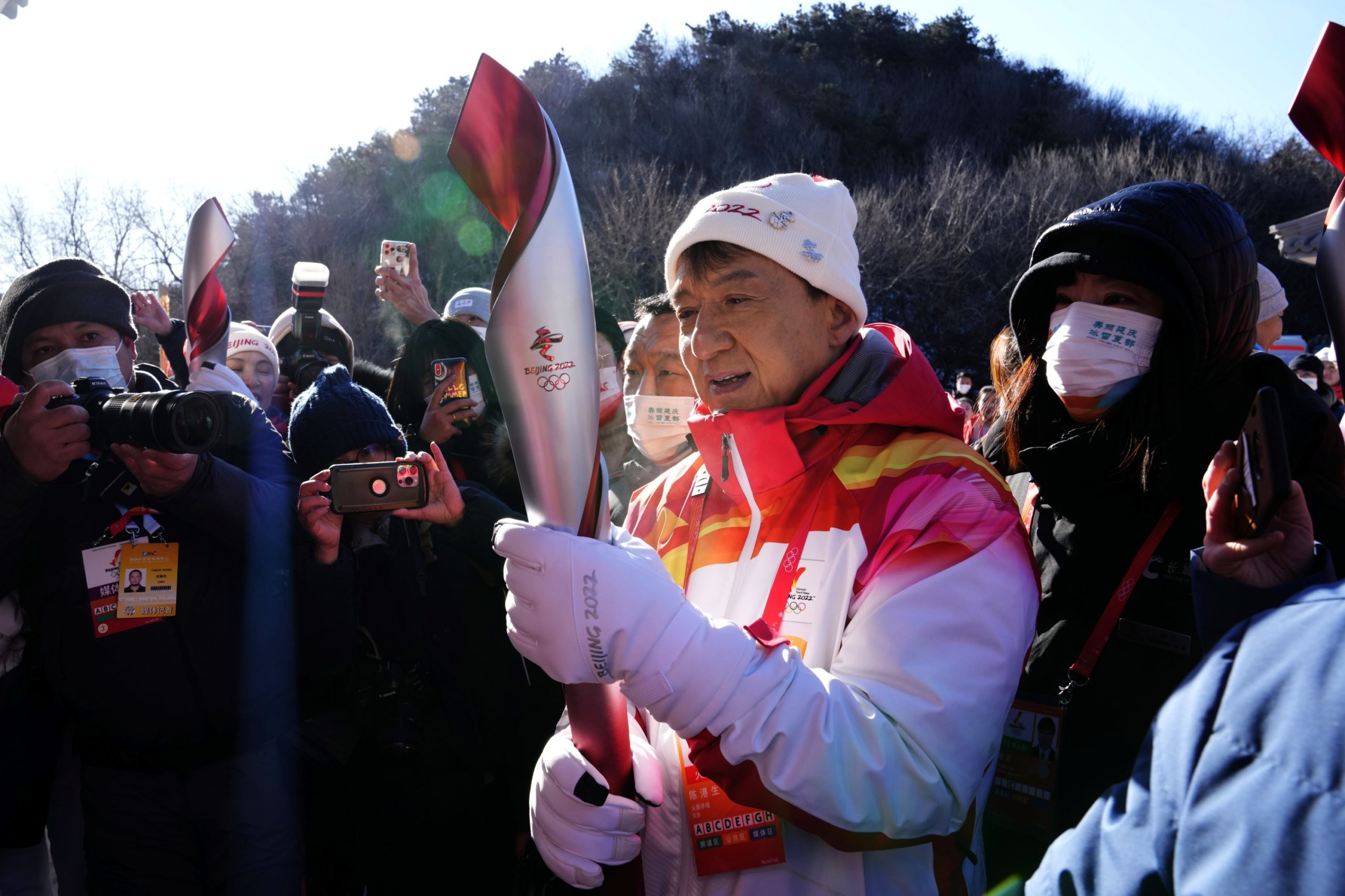 Jackie Chan Carries Olympic Torch Atop Great Wall