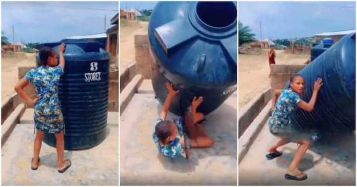 Lady causes stir after tank falls on her while doing #DropItChallenge