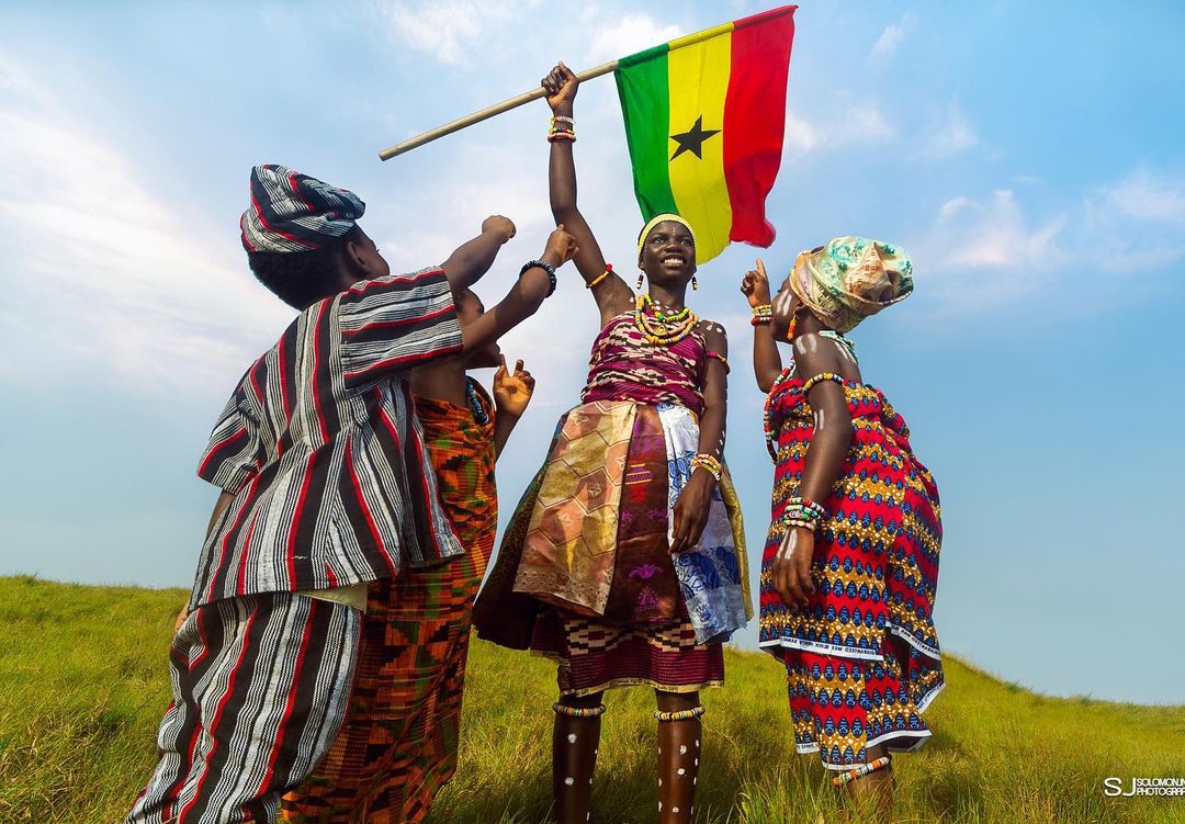 Ghanaians holding the Ghana Flag